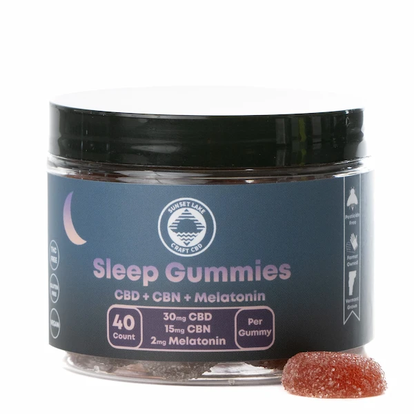 A 40-count jar of Sunset Lake CBD's Sleep Gummies with CBD, CBN, and melatonin. The label is dark blue and features purple accents and a crescent moon in the top left corner.