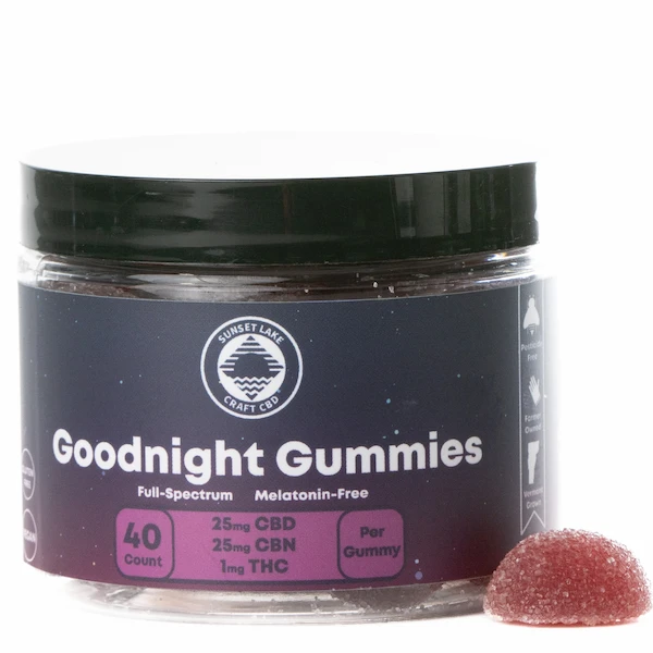 A 40-count jar of Sunset Lake CBD's Goodnight Gummies infused with CBD, CBN, and hemp-derived THC. The label is dark blue and spotted with stars to indicate nighttime use.
