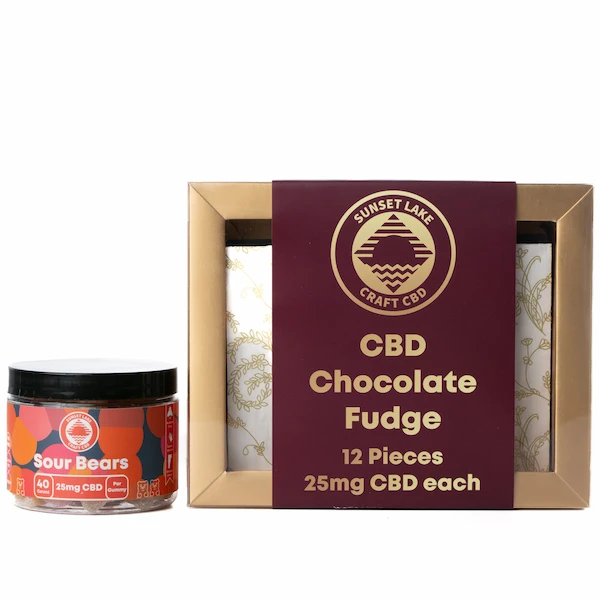 A 40-count of Sour Bear CBD Gummies next to a box of CBD Chocolate Fudge. Buy them together as the Tasty Treat CBD Bundle from Sunset Lake CBD.