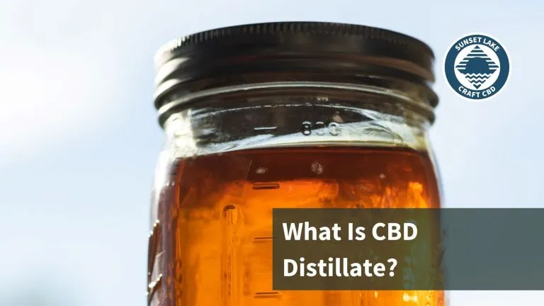 A mason jar filled with distillate. text reads "What is CBD distillate?"