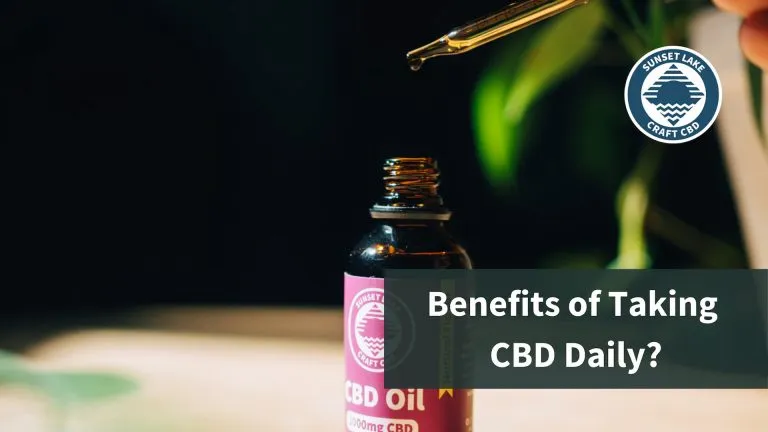 A CBD oil tincture with the dropper full of oil hovering over the bottle. The text reads "Benefits of taking CBD daily?"